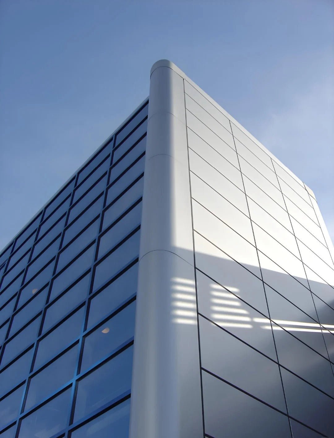 Black Rothnow® aluminum curtain wall panel, customized size, featuring sleek window design with modern architectural style.