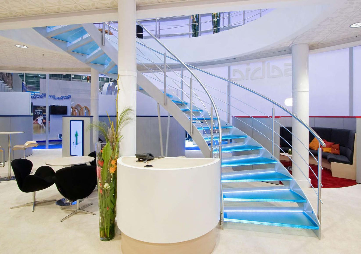 Rothnow® glass curved staircase RNCS03 with black finish, featuring sleek glass balustrades and elegant curved design.