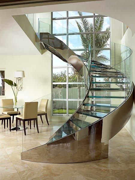Black Rothnow curved glass staircase, customized size, showcasing sleek, modern design with curved steps and glass panels.