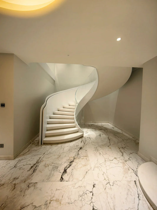 Rothnow® curved stone staircase with custom size, black finish, showcasing elegant design and craftsmanship for interior stairs.
