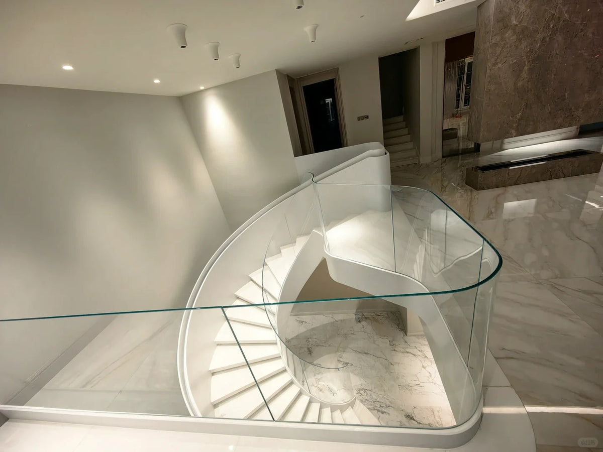 Rothnow Curved Staircase RNCS06 in black stone, showcasing custom size, elegant curved design, and sturdy construction.