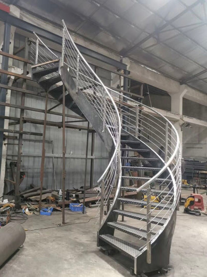 Black Rothnow curved staircase for outdoor use, showcasing custom-sized stairs with elegant, smooth curves and sturdy construction.