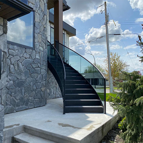 Rothnow outdoor curved staircase in black, custom-sized with elegant design, suitable for exterior building access.