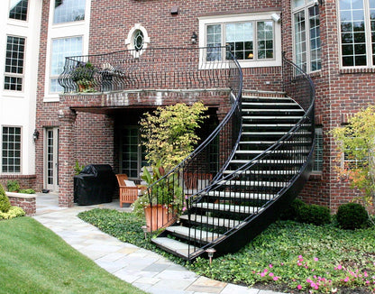 Black Rothnow curved outdoor staircase with custom size, featuring elegant design and sturdy railings for exterior access.