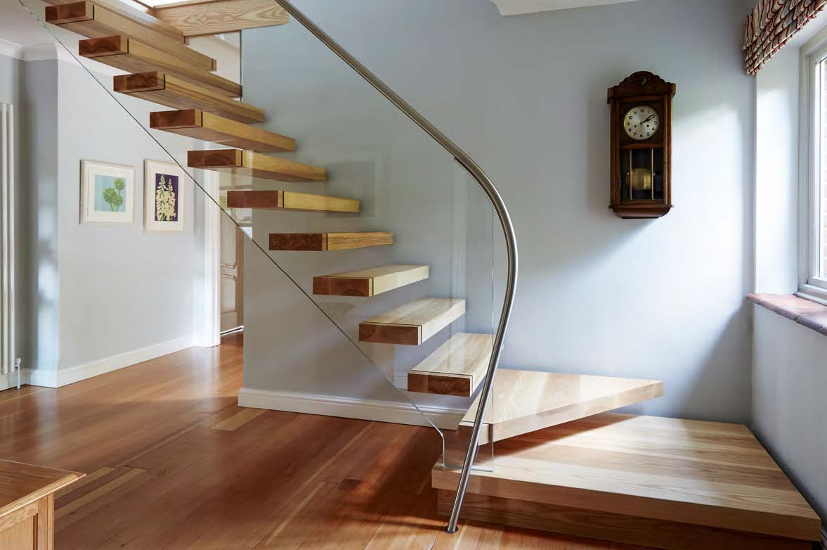 Rothnow® Floating Staircase RNFS01-Wood in black, modern wooden staircase with sleek design and floating steps, custom-sized.