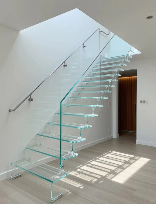 Black Rothnow Floating Staircase RNFS04 with glass steps, modern and sleek design suitable for contemporary interiors.