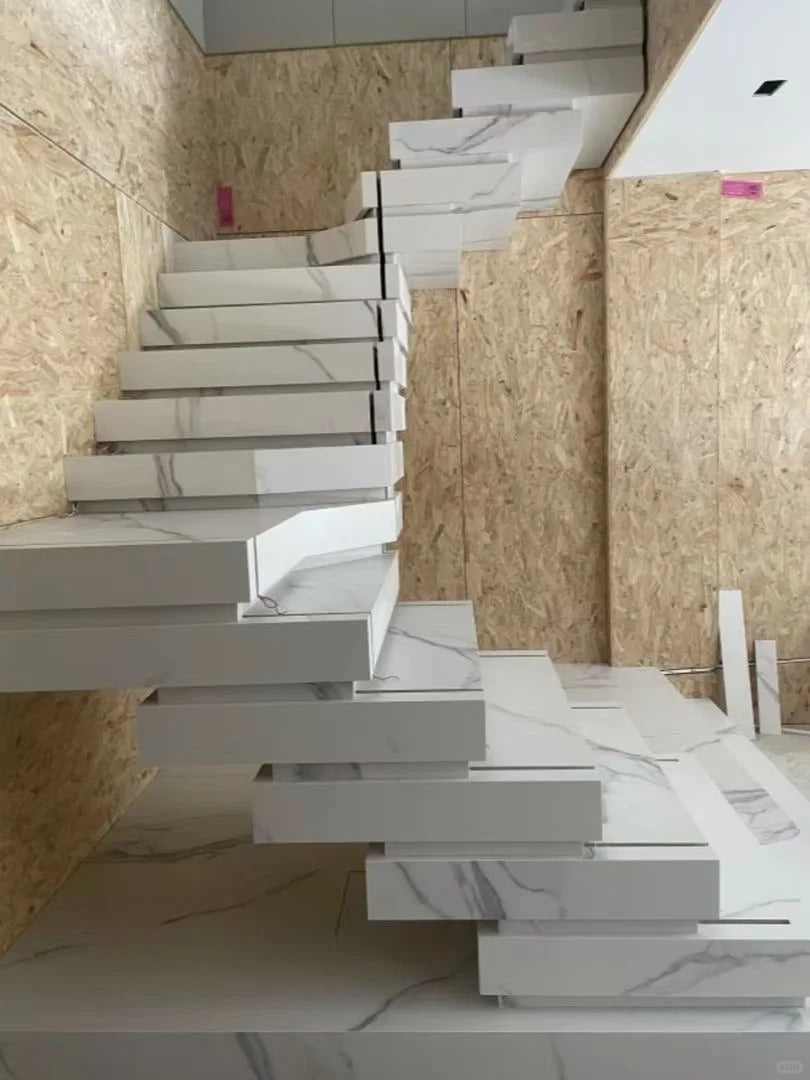 Rothnow® floating staircase RNFS06 with black stone steps, modern design, installed in a contemporary interior setting