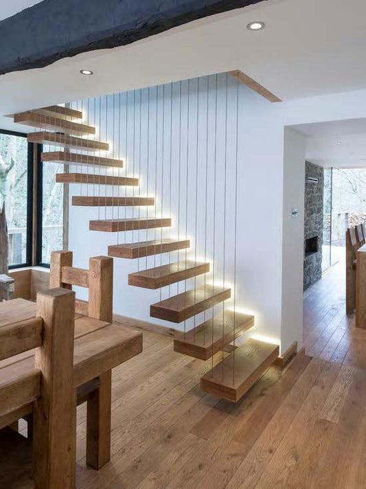 Rothnow® floating staircase with black cable railing, custom-sized modern staircase in a sleek design with sturdy steps and minimalist style