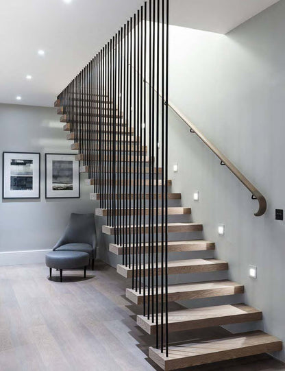 Rothnow® floating staircase with cable railing, black custom size, modern design, showcasing sleek floating steps and sturdy cable support.