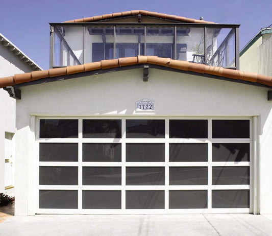 Black Rothnow garage door with aluminum plate, customized size, for residential or commercial garage entry.