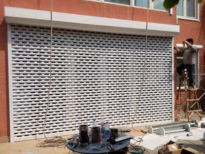 Black Rothnow® aluminum roll-up garage door, customized size with sleek, modern design for residential or commercial use.