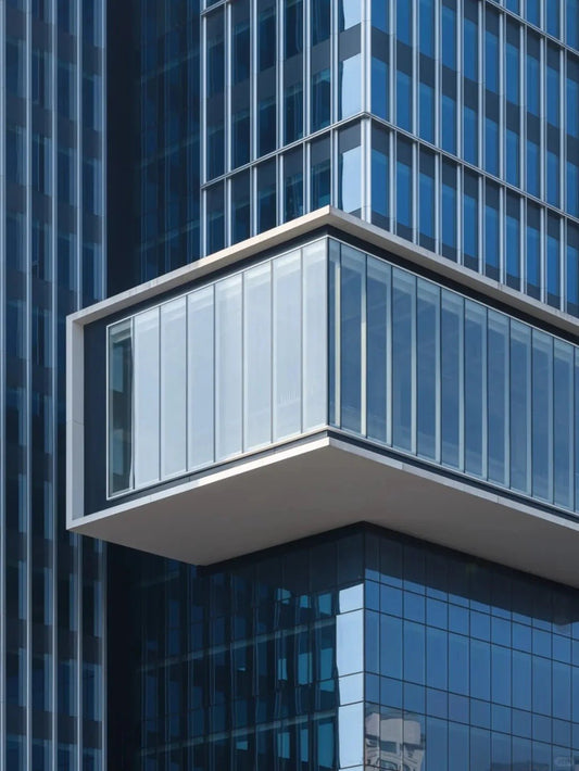 Black Rothnow glass curtain wall with exposed frame, showcasing a sleek, customized window design for modern building facades.