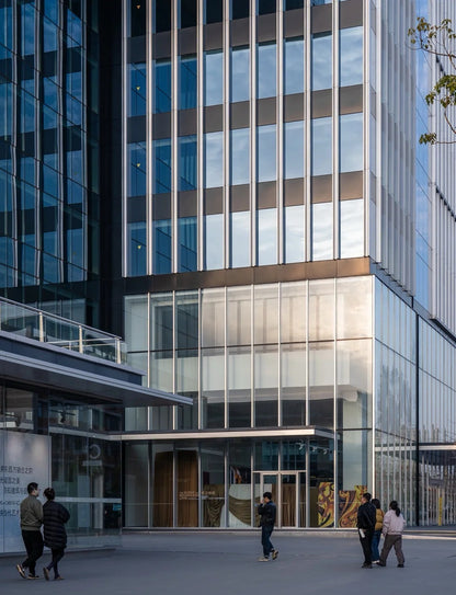 Black Rothnow glass curtain wall with exposed frame, showcasing a sleek modern window design for building facades.