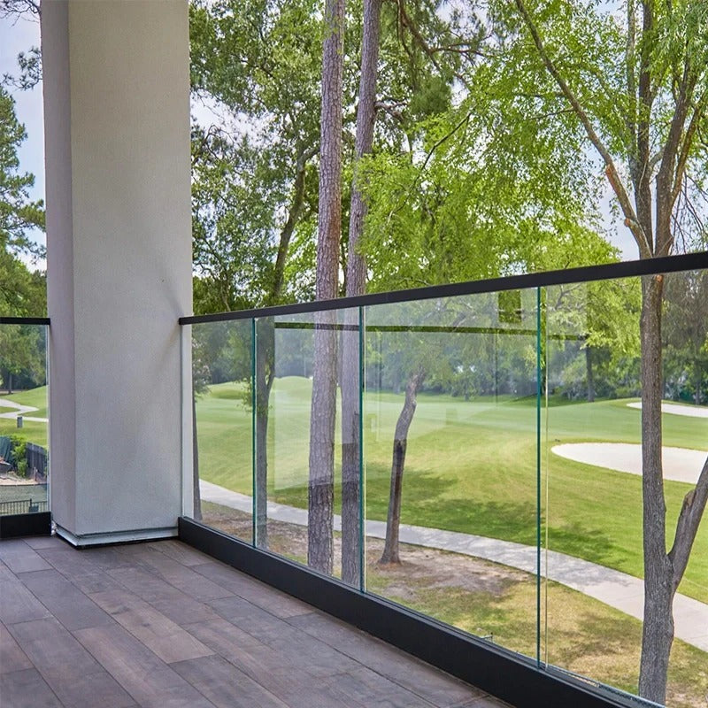 Rothnow® black U-channel glass railing for safe balcony or stair protection, featuring sleek glass panels and durable metal frame.