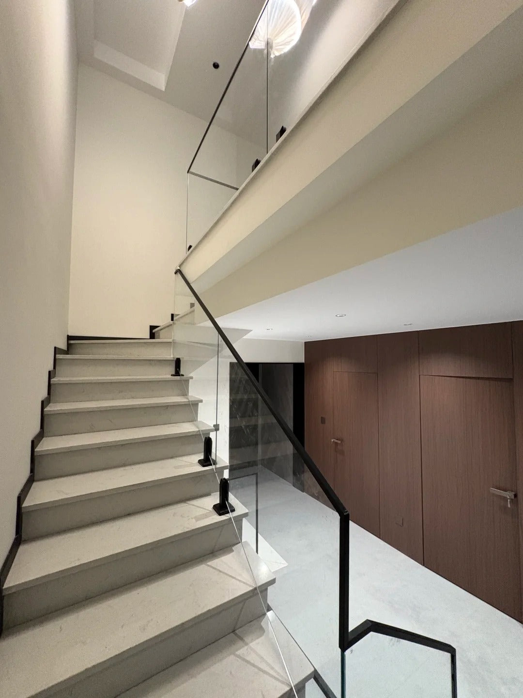 Black Rothnow glass railing with spigot fittings, customizable size, modern safety barrier for outdoor or balcony installation