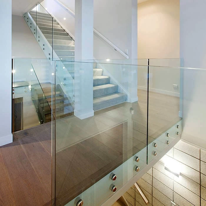 Black Rothnow® Glass Railing RNGR06 standoff style, showcasing sleek glass panels and sturdy mounting hardware for modern safety.