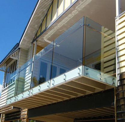 Rothnow® black glass railing RNGR06 standoff design, showcasing sleek glass panels with metal hardware for modern safety and style.