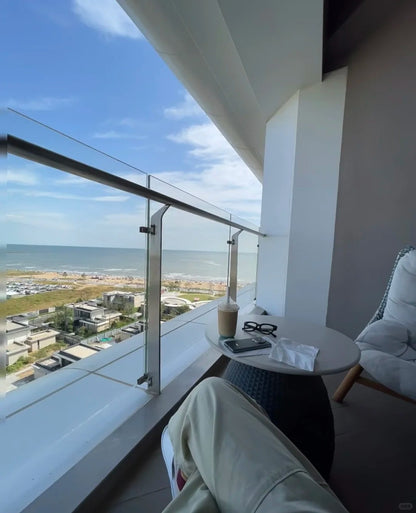 Black Rothnow Glass Railing with post, customizable size, modern safety barrier for balconies or decks, durable and sleek design.