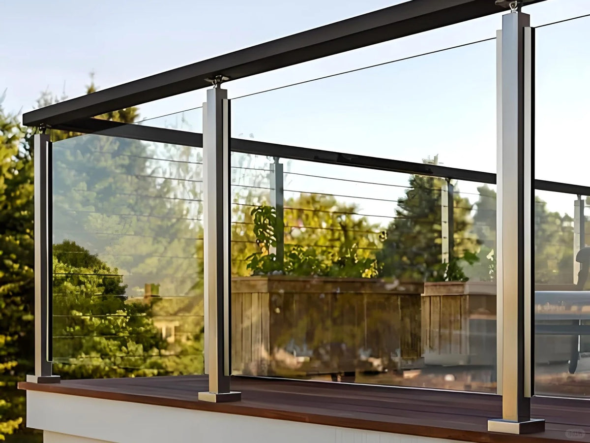 Rothnow Glass Railing RNGR08 Post with black metal frame, modern safety barrier for balconies or decks, clear glass panels.