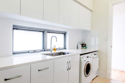 Rothnow® Laundry Cabinet RNLC05 in black, customized size, with storage shelves and doors for organized laundry space.