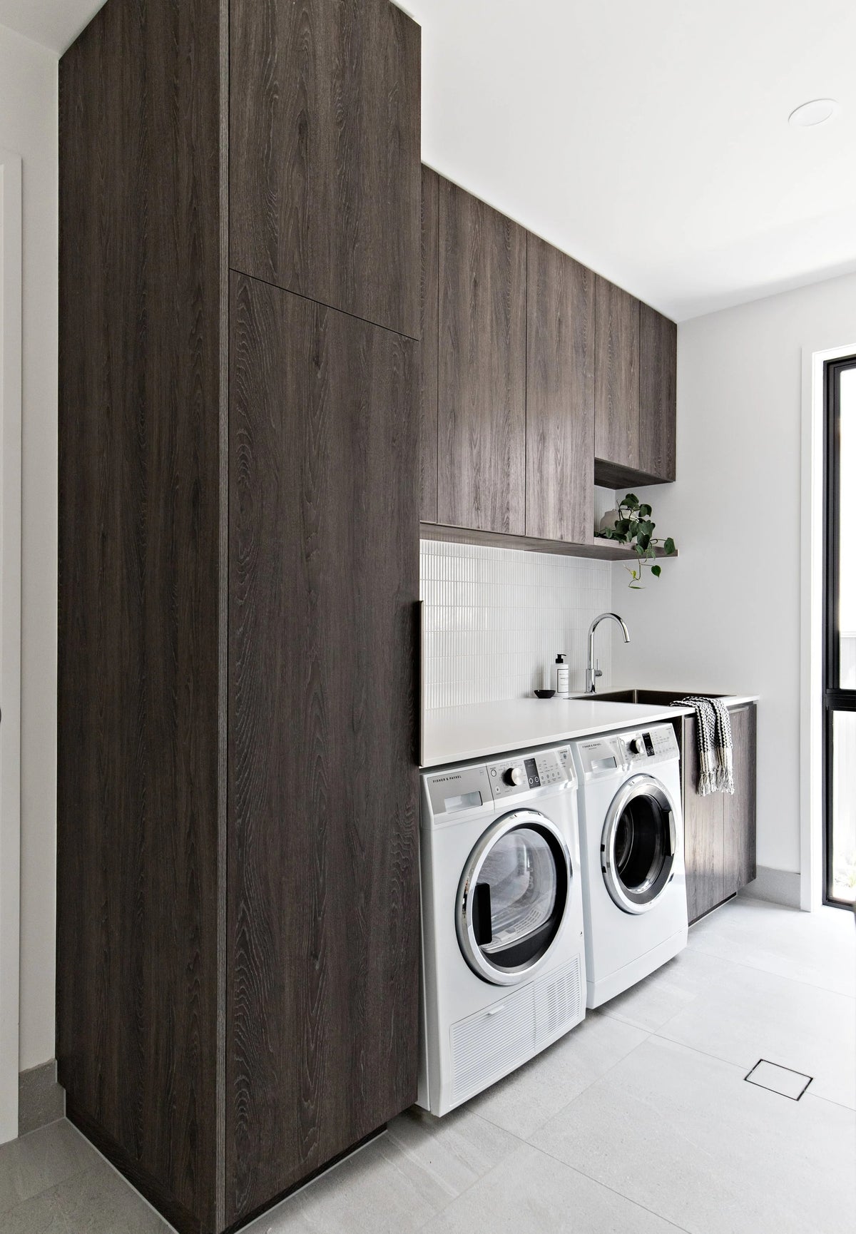 Black Rothnow Laundry Cabinet RNLC08 with customized size, featuring a sleek design and storage compartments for laundry organization.