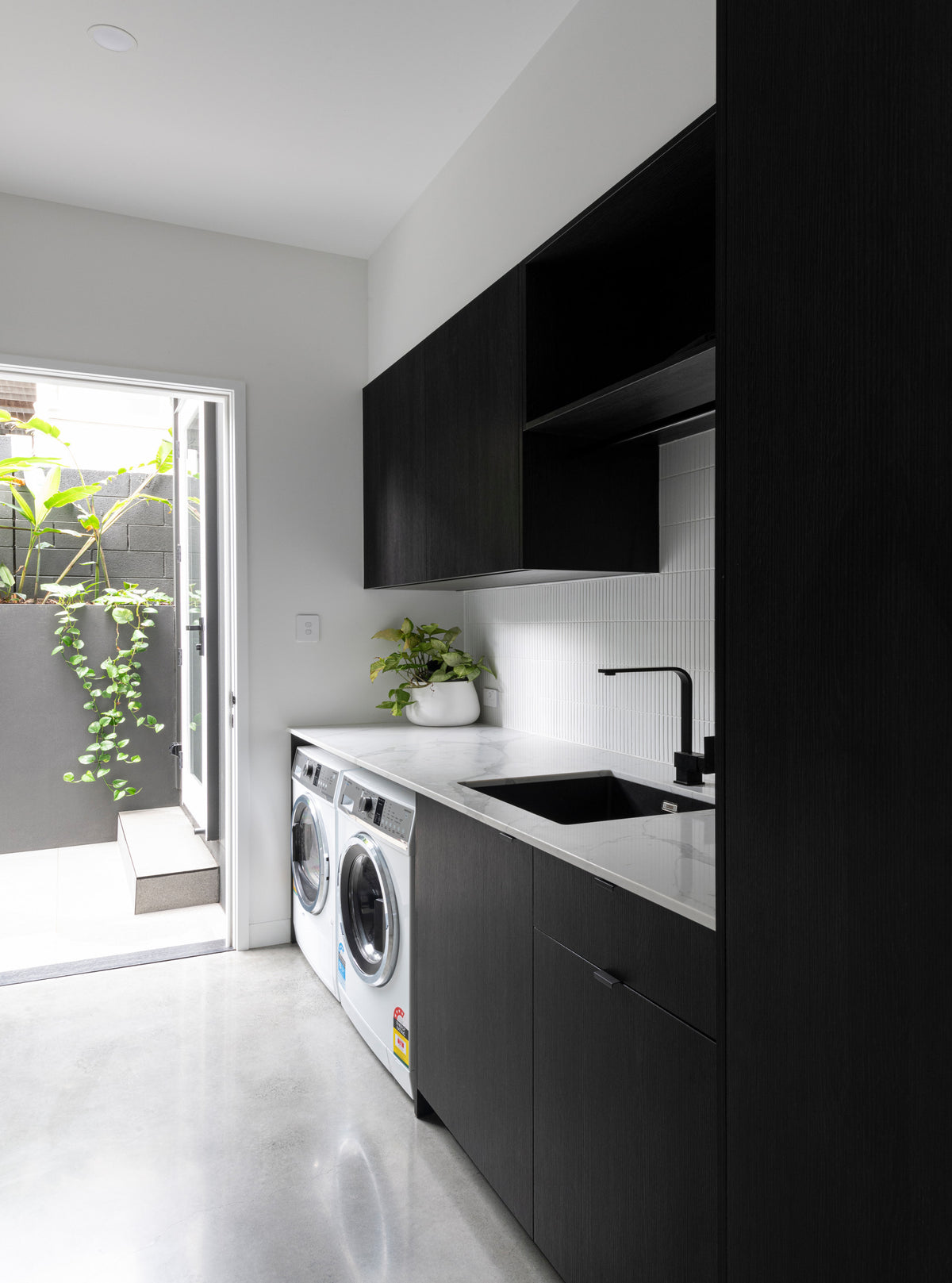 Black Rothnow® Laundry Cabinet RNLC08 with customized size, featuring storage shelves and a sleek modern design.