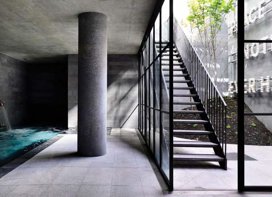 Black Rothnow outdoor staircase with sturdy metal steps and handrails, designed as a fire escape staircase for building safety.