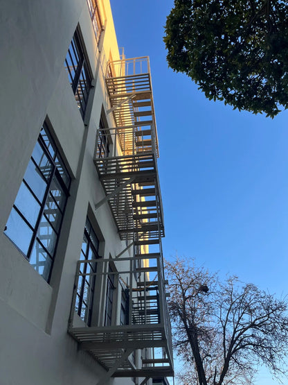 Black Rothnow outdoor staircase RNCS02 fire escape staircase with sturdy metal steps and safety railings.