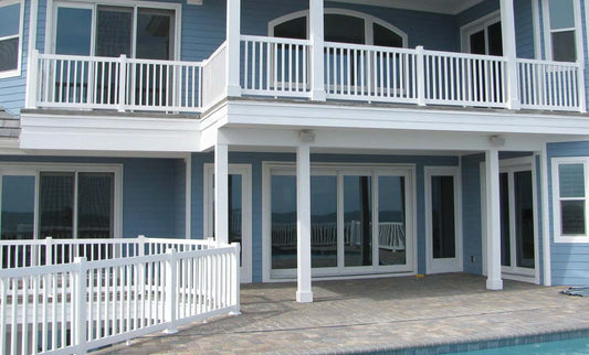 Black Rothnow PVC railing and fence showing a sleek, customized design with vertical panels and sturdy construction.