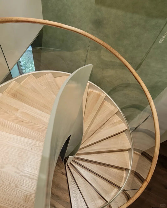 Rothnow® Wood Spiral Staircase RNSS03 with black finish, custom size, showcasing elegant curved design and wooden steps.
