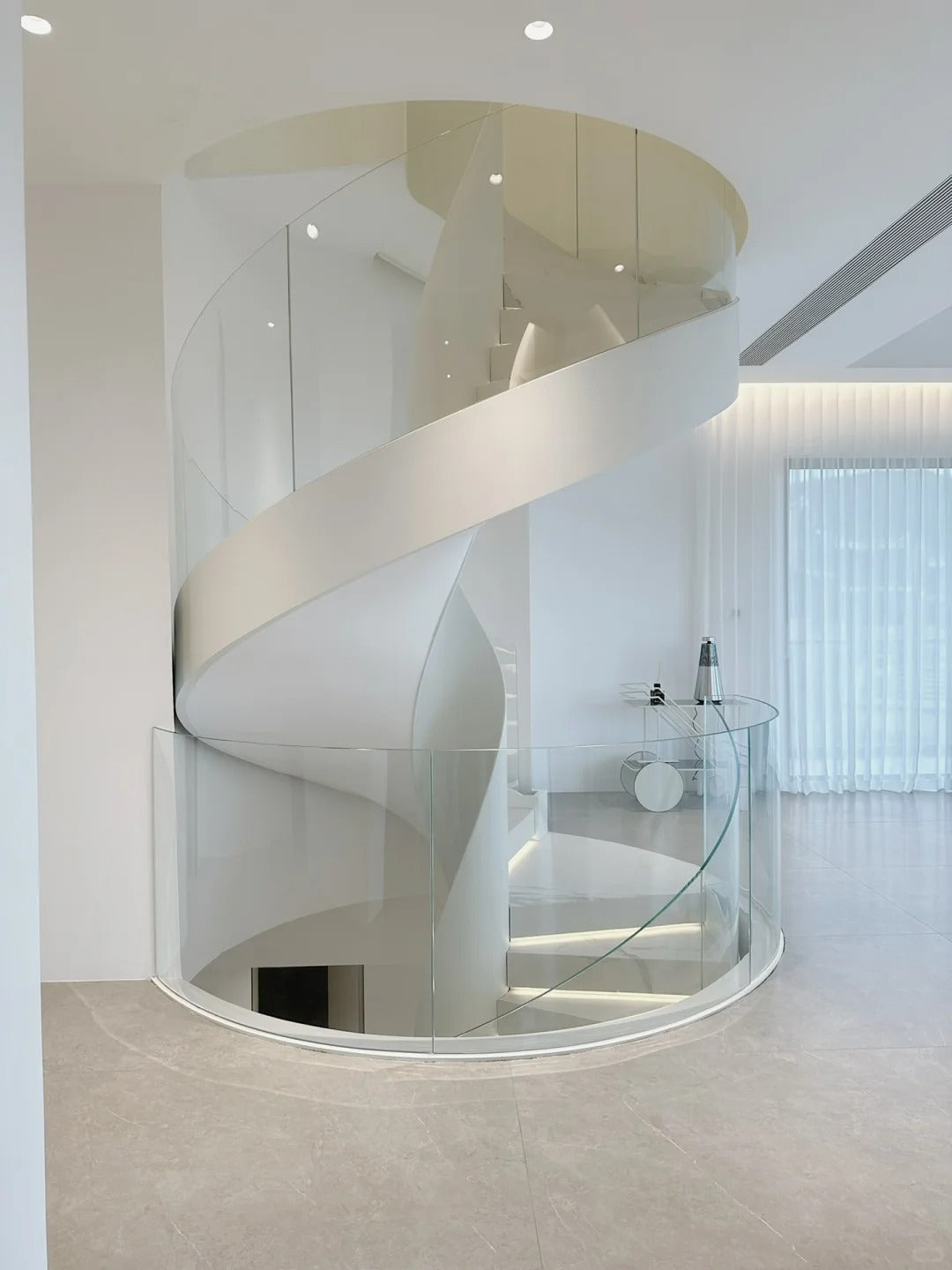 Black Rothnow Spiral Staircase RNSS06 art-style staircase with custom size, featuring elegant curves and detailed metal railing.