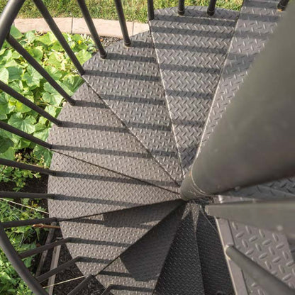 Black Rothnow spiral staircase RNSS07 outdoor carbon steel staircase with custom size, featuring curved steps and safety railings.