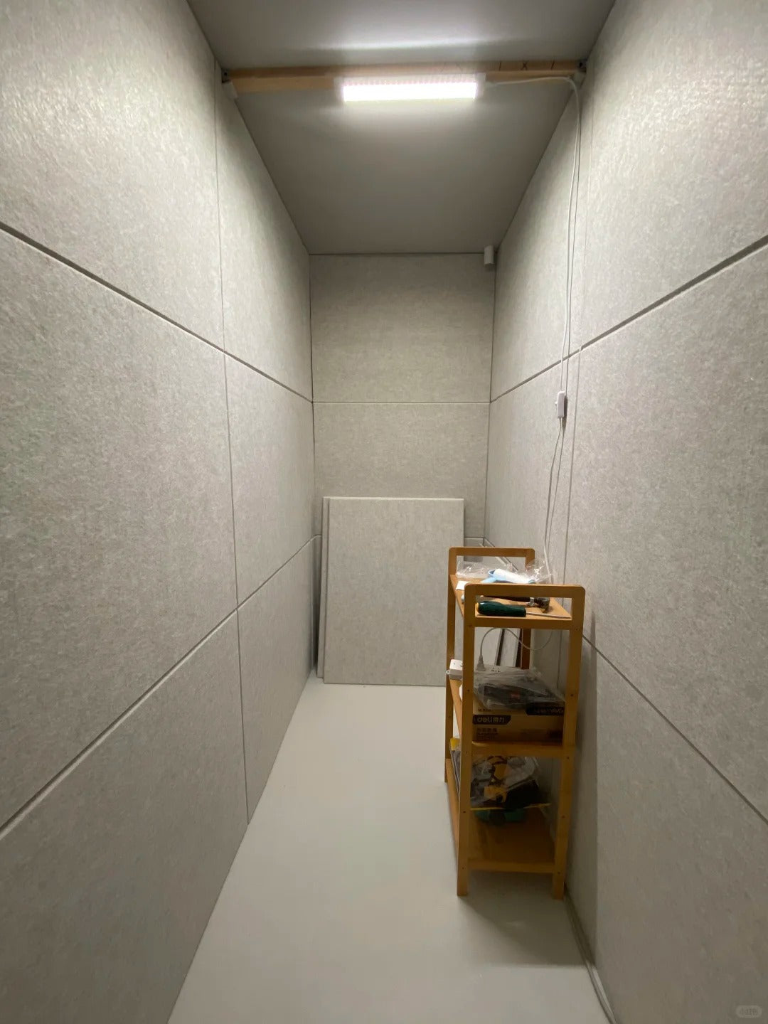 Black Rothnow Wall Panel RNSP08 sound-proof wall panel, customized size, showing sleek, soundproofing surface and modern design.