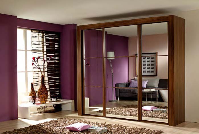 Rothnow Wardrobe-RNWC04 sliding door closet with black护栏, modern design, custom size, and sleek finish in a contemporary bedroom setting.
