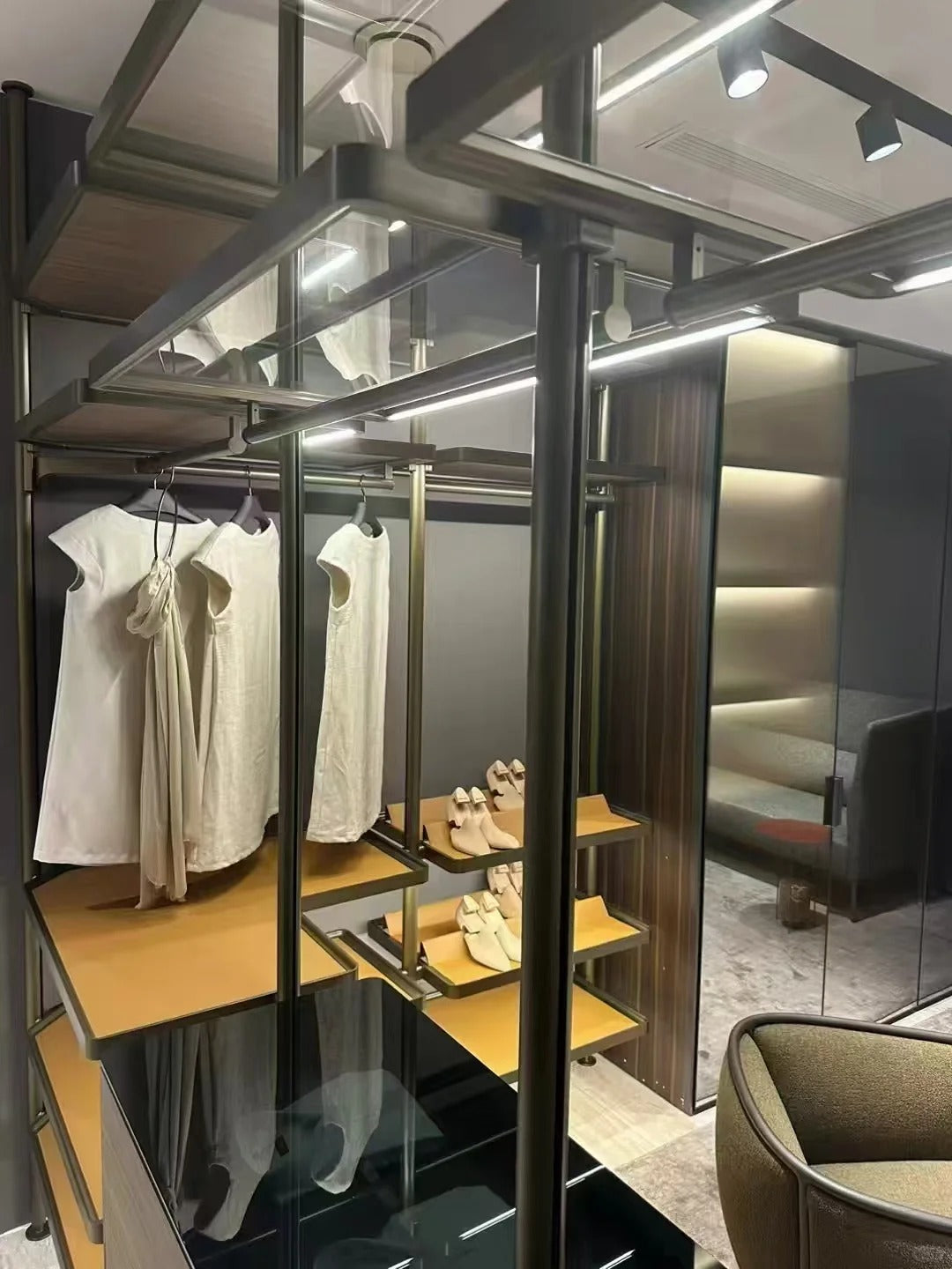 Wall-mounted Rothnow wardrobe RNWC08 with black finish, featuring a customizable size and secure护栏 for organized closet storage.