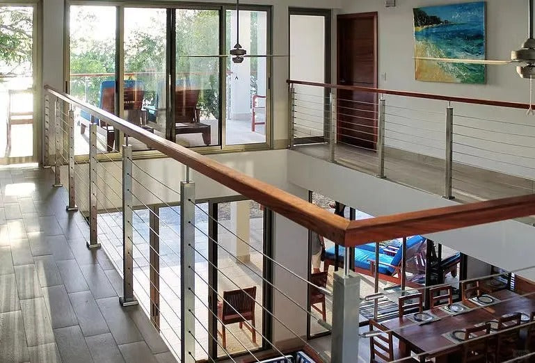 Rothnow wire cable railing RNWR05 for staircase, black steel guardrail with sleek cable design, custom-sized for modern staircases.