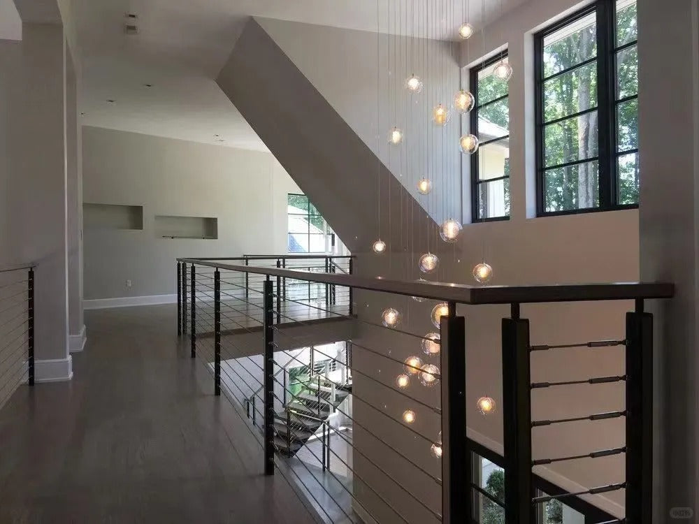 Rothnow wire cable staircase railing in black, custom-sized for modern interior or outdoor staircase safety.