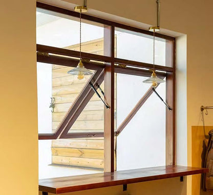 Rothnow® wooden awning window with black frame, custom size, showcasing clear glass and sturdy wooden construction.