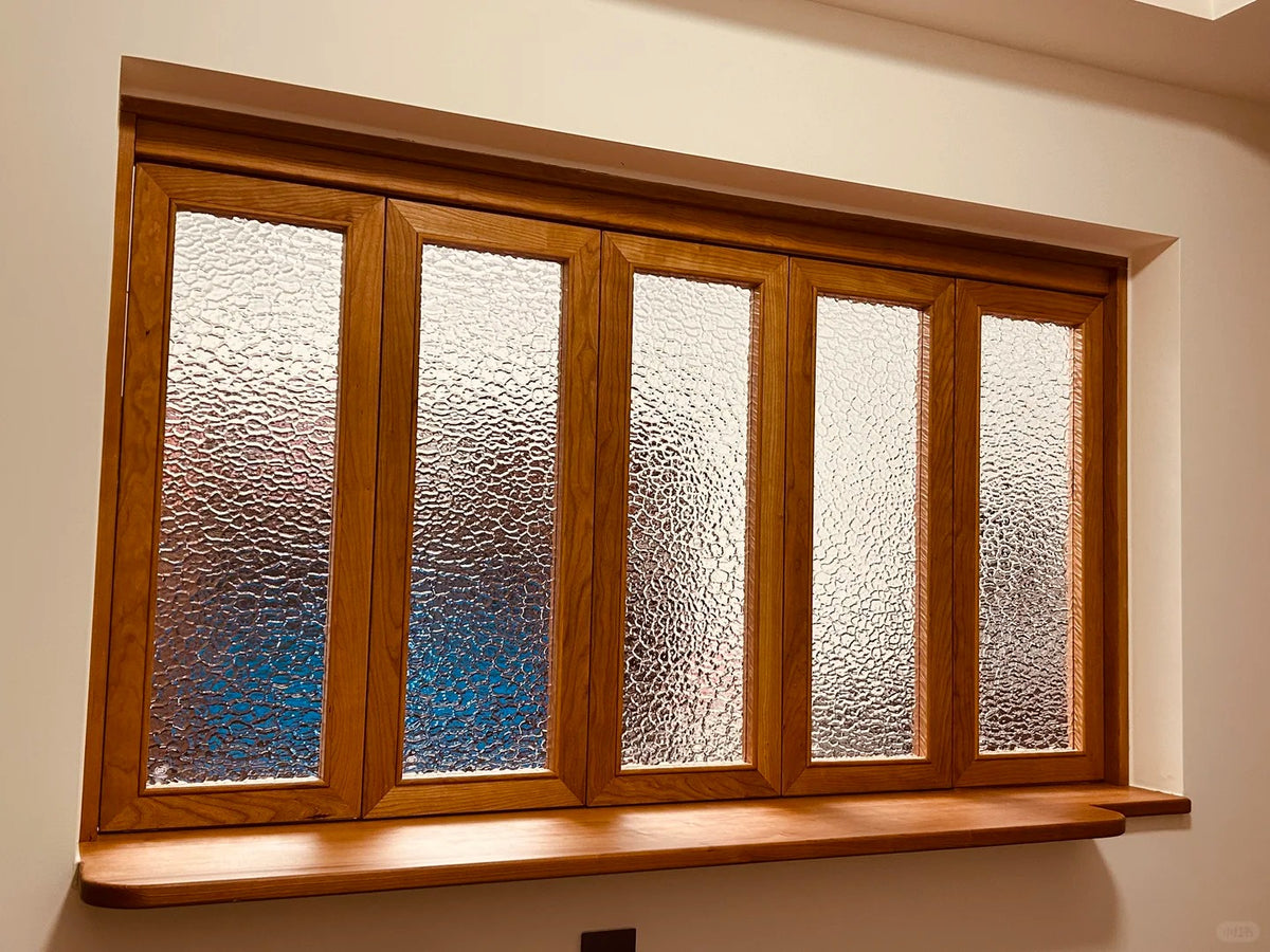 Rothnow® Wooden Folding Window in black with multiple panes, designed for versatile natural light and ventilation.