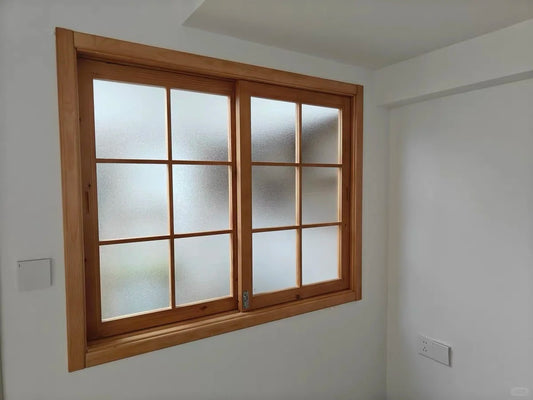 Rothnow Wooden Sliding Window RNWW01 with black finish, custom size, showcasing a modern interior with natural light.
