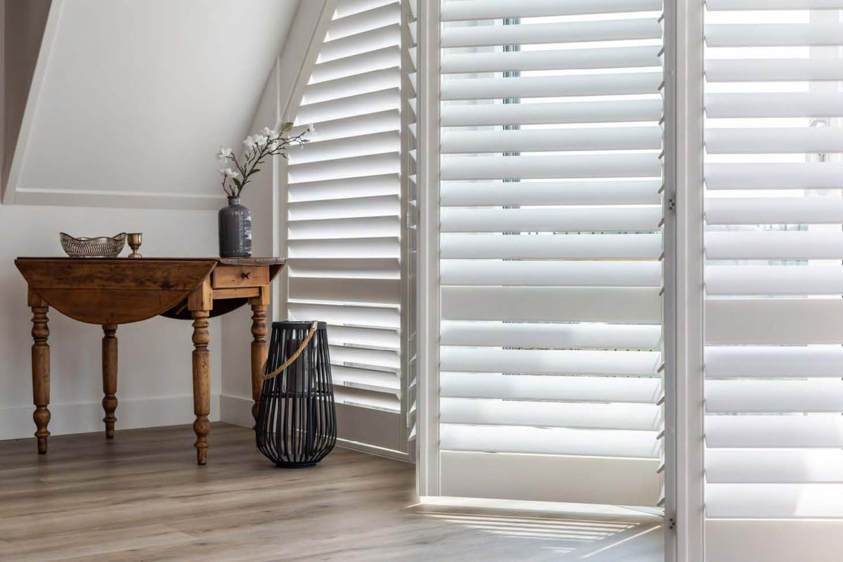 Rothnow wooden window shutter in black, solid wood design, custom-sized for window installation, showcasing craftsmanship and natural finish.