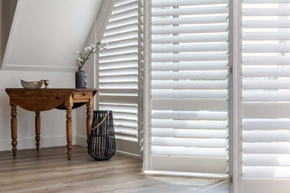 Rothnow wooden window shutter in black, solid wood design, custom-sized for window installation, showcasing craftsmanship and natural finish.