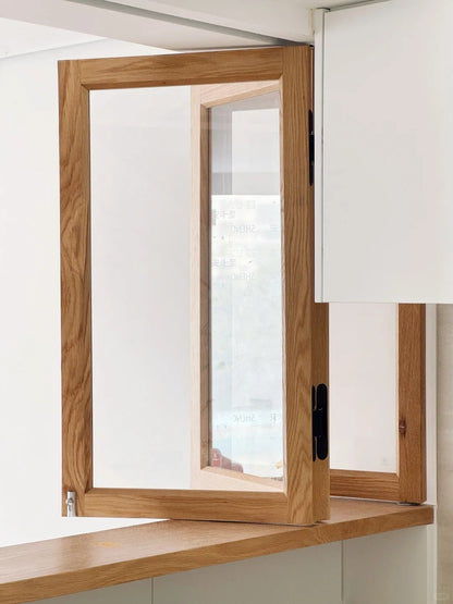 Rothnow® Wooden Folding Window in black, custom-sized, with multiple panes, showcasing its elegant design and craftsmanship.