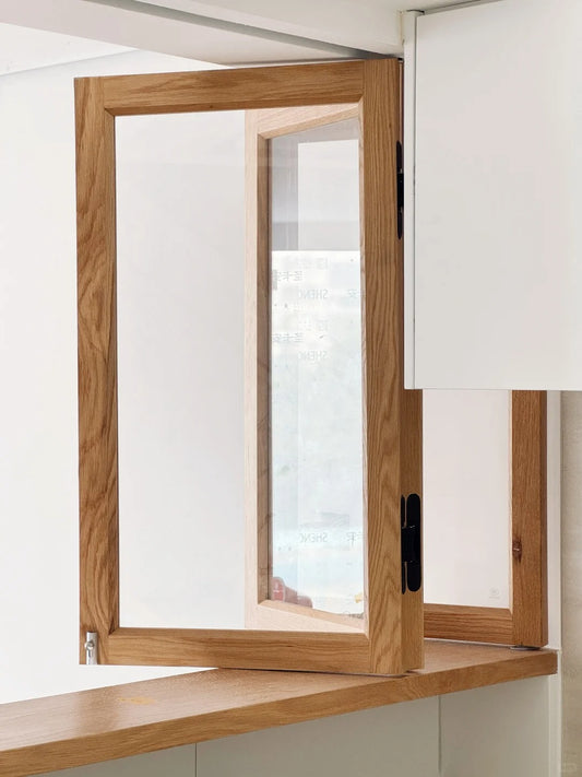 Rothnow® Wooden Folding Window in black, custom-sized, with multiple panes, showcasing its elegant design and craftsmanship.
