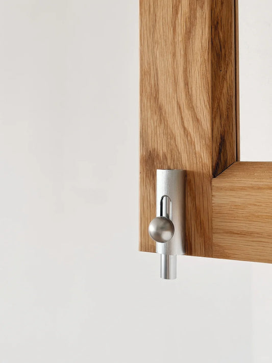 Rothnow® Wooden Folding Window in black, custom-sized, featuring multiple glass panes and a sturdy wooden frame.