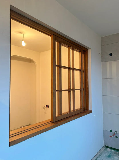 Rothnow wooden sliding window with black frame, custom size, featuring clear glass and sleek design for modern interiors.