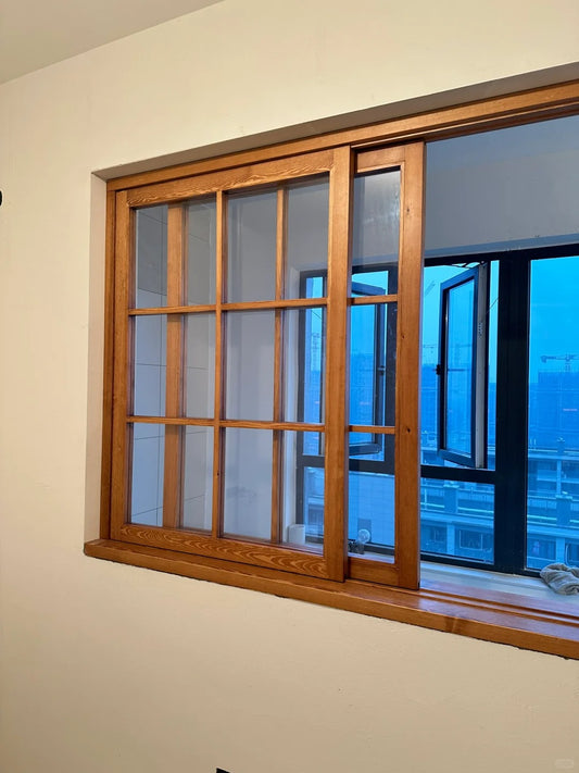 Rothnow wooden sliding window with black frame, custom-sized window made of wood, featuring clear glass panes for natural light.