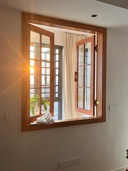 Rothnow® wooden casement window in black, custom-sized, featuring clear glass panes and traditional window design.