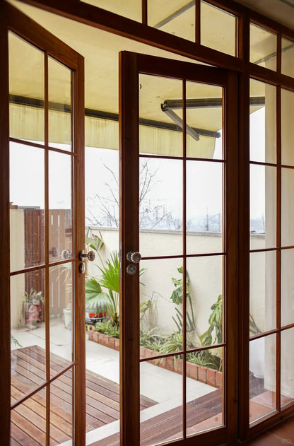 Rothnow® wooden casement window with black finish, custom-sized, featuring clear glass and traditional window design.