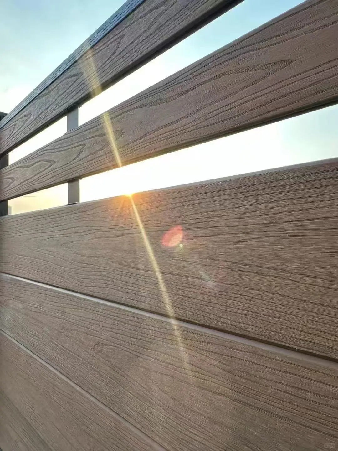 Black Rothnow WPC fence RNWF01, custom-sized outdoor fencing panel with durable wood-plastic composite material.